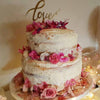 Naked cake with freeze dried edible flowers